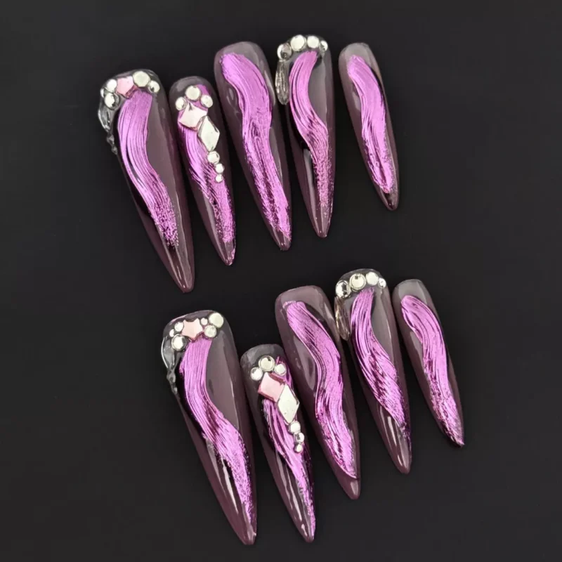 Night Mirage Press-On Nails with pink chrome brushstroke and rhinestone accents