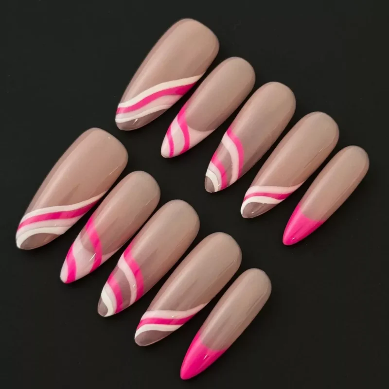 Nude almond press-on nails with matte base and hot pink wave design – front angle view