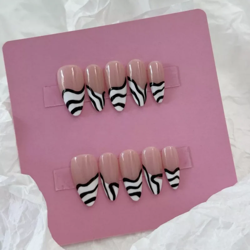 Nude Base Press-On Nails with artistic monochrome tips