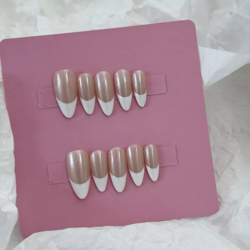 Shimmer Nude French Tip Press-On Nails displayed on pink card