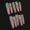 Nude Gem Press-On Nails with Pink Swirl French Tip and Rhinestone Charms