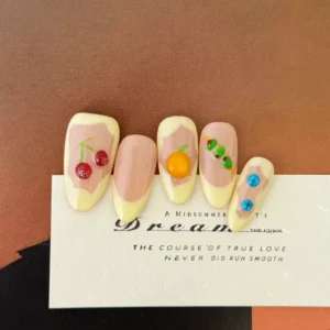Nude Yellow Press-On Nails styled with afternoon tea card
