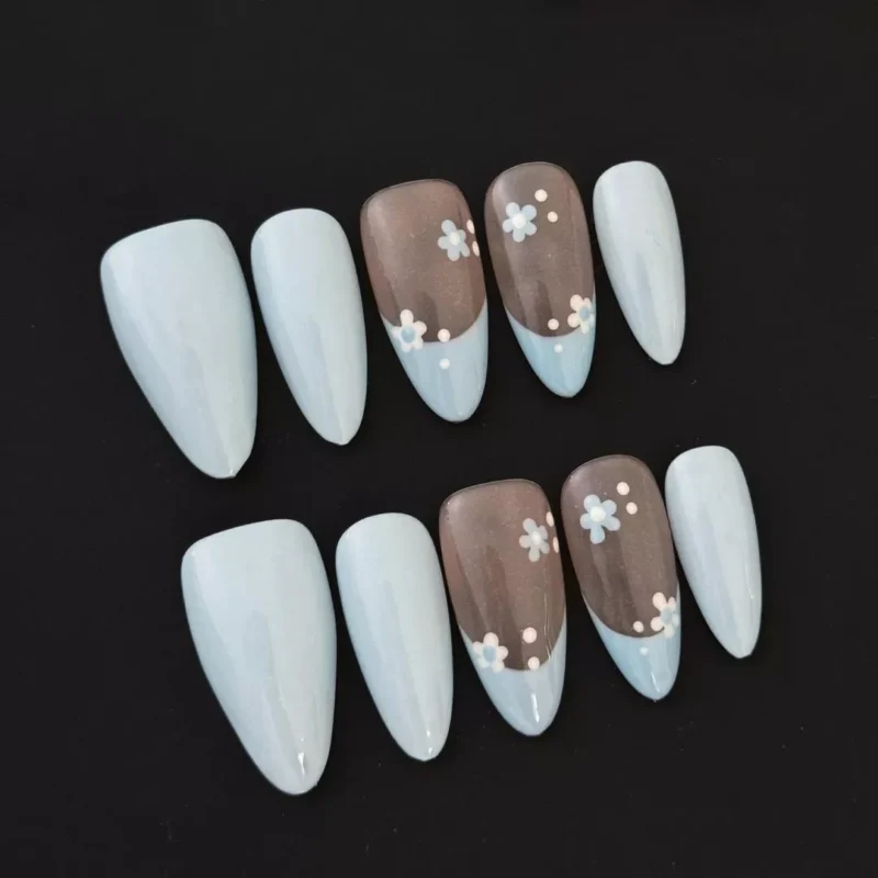 Pastel Blue Press-On Nails with Nude Base and Floral French Tips - side view