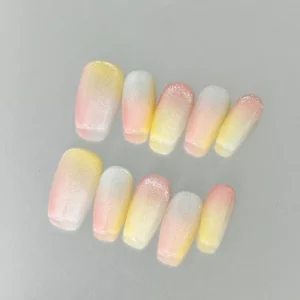 Ombre pastel press-on nails with subtle glitter texture