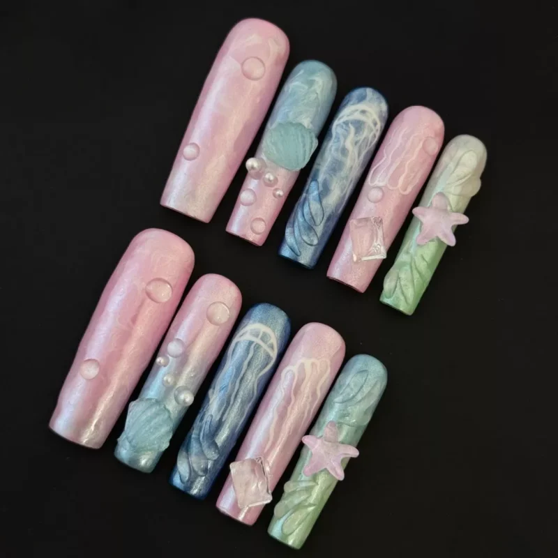 Underwater Dream Press-On Nails featuring pastel ocean colors and 3D starfish accents