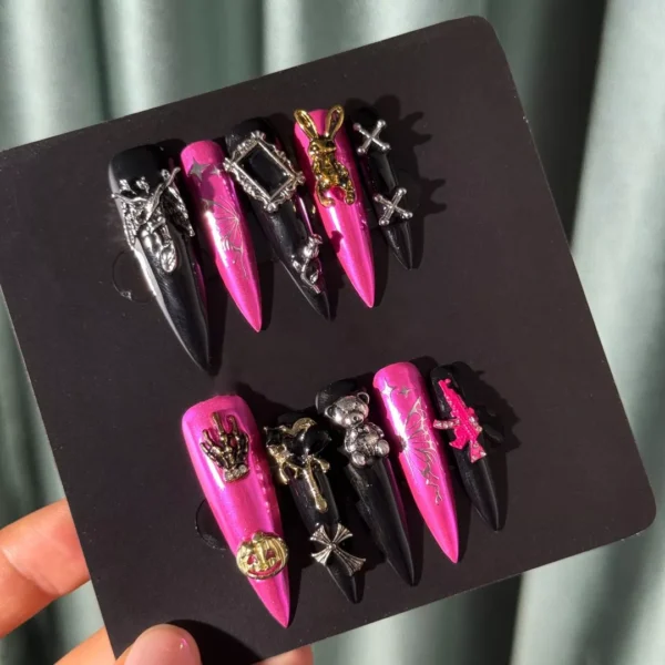 Pink Black Press-On Nails full set under natural light with detailed Halloween accents