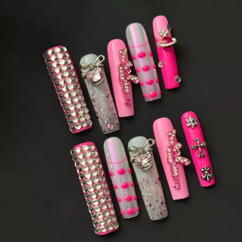 Bling Punk Press-On Nails with pink chrome base and metallic studs