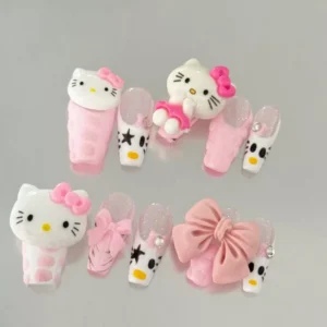 Short pink glitter press-on nails with Hello Kitty character and big bow