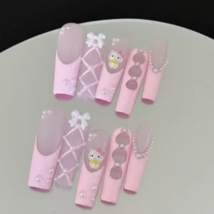 Pink and gray press-on nails with cartoon 3D kitty and lace-up design