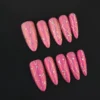 Pink Ombre Glitter Press-On Nails - Diamond Line Accent Design 5 Pink Ombre Glitter Press-On Nails with diamond accents on a black background