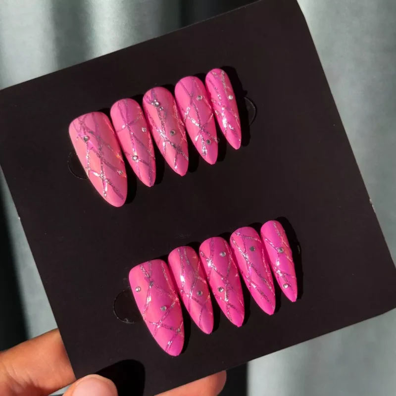 Pink Ombre Glitter Press-On Nails displayed in natural light