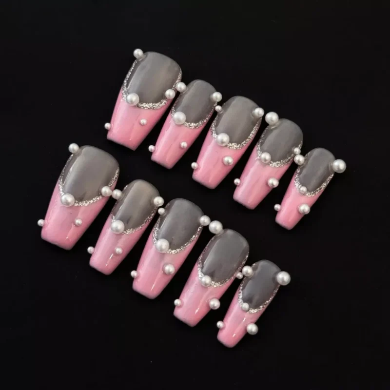 Pink Pearl Press-On Nails with glitter French tips and 3D pearl accents - full hand view