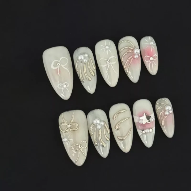 Pink Press-On Nails with gradient blush base and pearl ribbon details