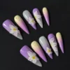 Purple Ombre Press-On Nails - 3D White Flower Design 4 Purple ombre press-on nails with 3D white floral accents on black background