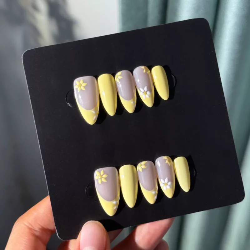 Reusable press-on nails in yellow French style with almond silhouette