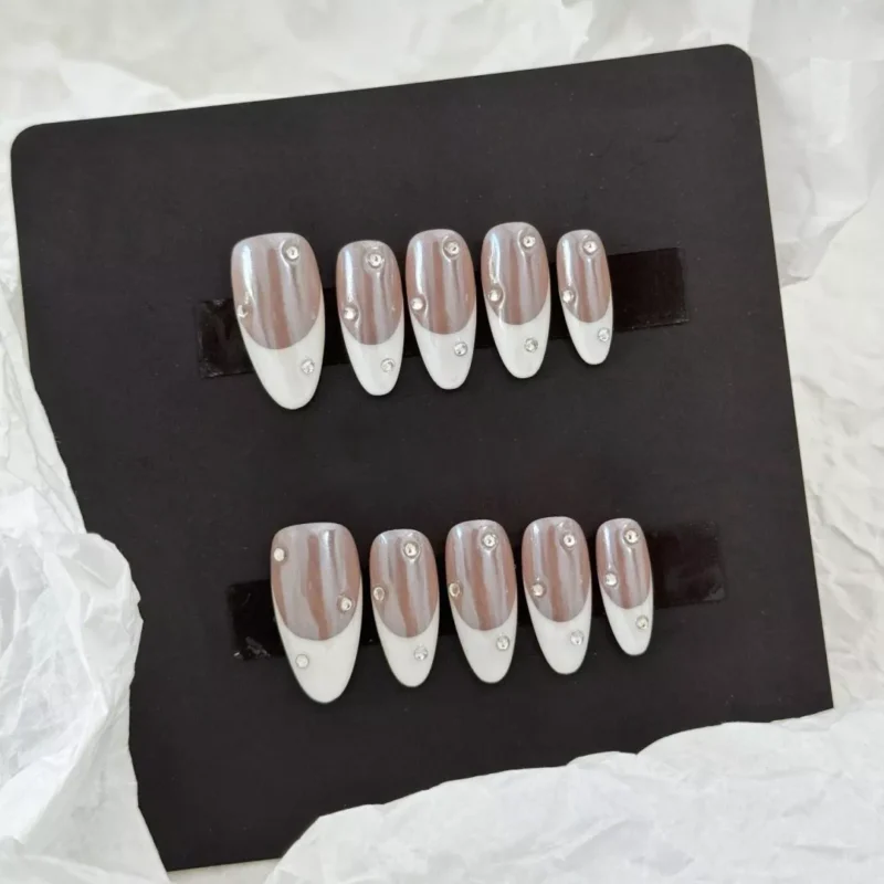 Rhinestone French Tip Nails with Nude Base – Close-Up