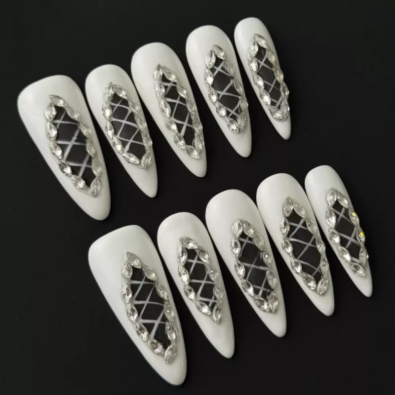 Side view of White Lattice Press-On Nails showing glossy finish and cutout design