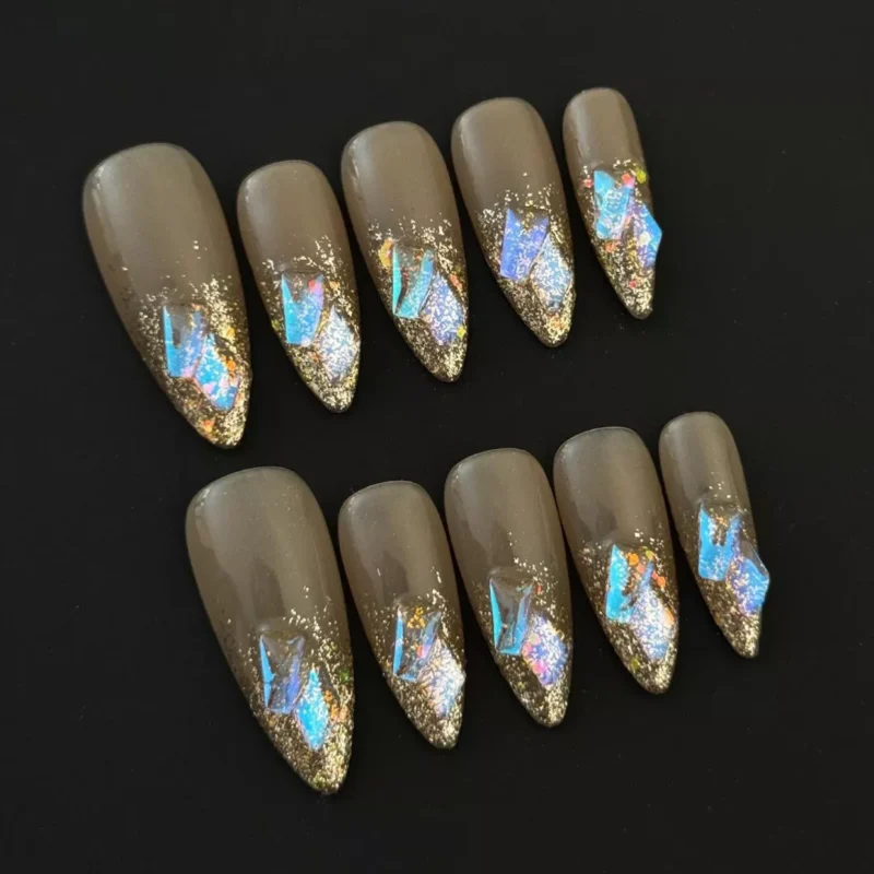 Side view of Iridescent French Press-On Nails with glossy nude base and glitter tips
