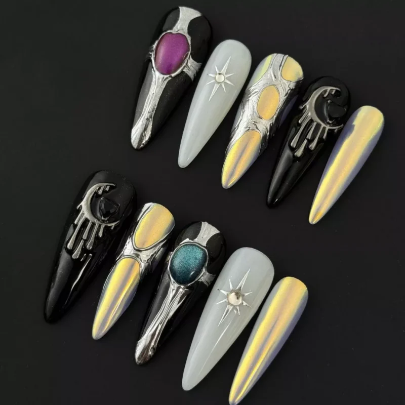 Side angle view of Meteor Chrome Press-On Nails emphasizing 3D star accents and black chrome base