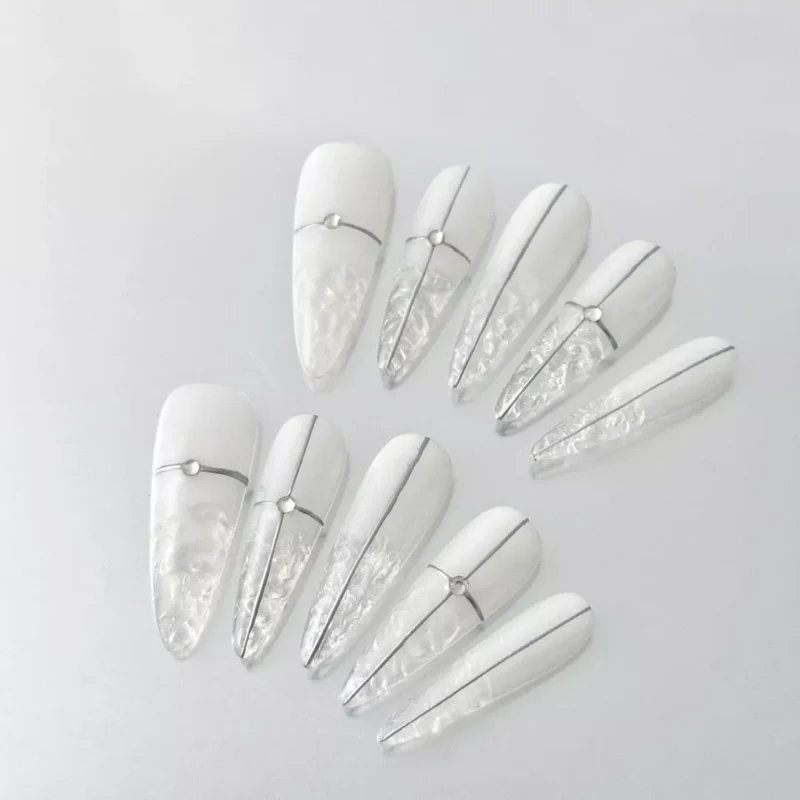 Silver Frost Press-On Nails featuring crystal accents and split metallic design