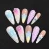 Spring Blossom Press-On Nails with pastel gradient and 3D flowers, black background