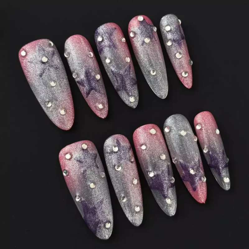 Starry glitter press-on nails in pink and purple gradient