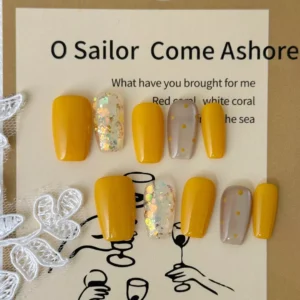 Yellow Square Press-On Nails with iridescent foil and nude polka design, displayed on art card