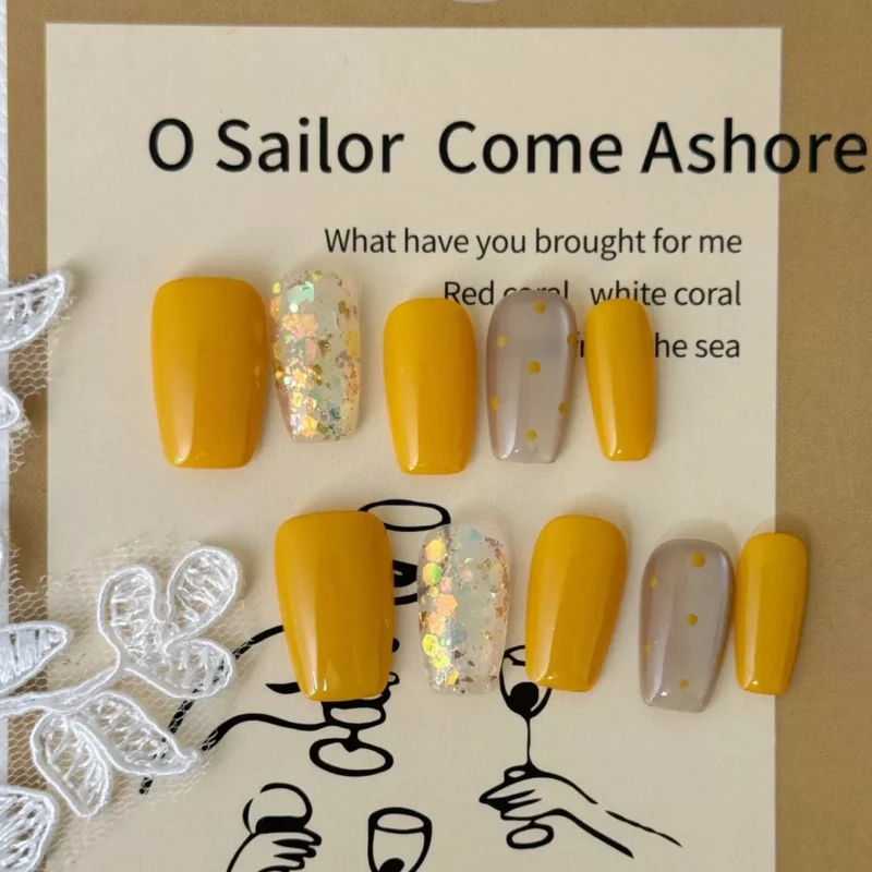 Yellow Square Press-On Nails with iridescent foil and nude polka design, displayed on art card