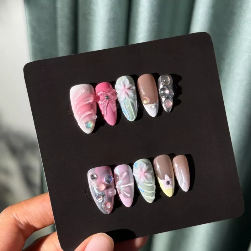 Full set of summer pastel 3D carving press-on nails under natural sunlight