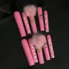 Sweet leopard press-on nails in pink with glitter texture and heart charms