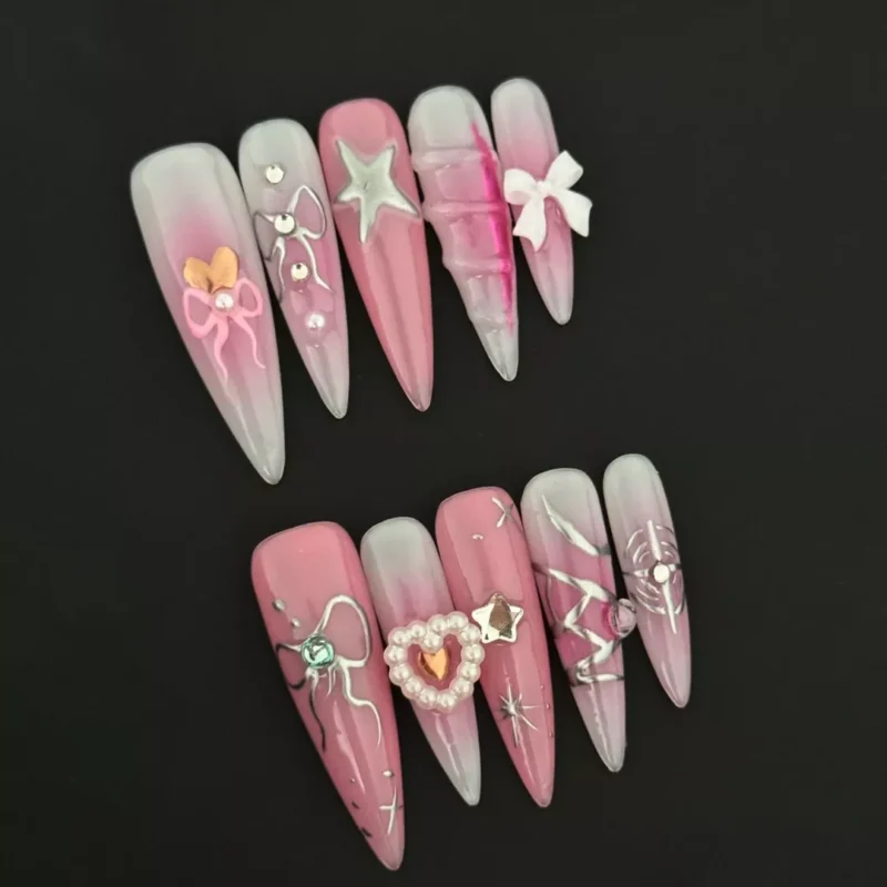 Sweet Wish Press-On Nails with pink ombre gradient, heart gems, and silver bows