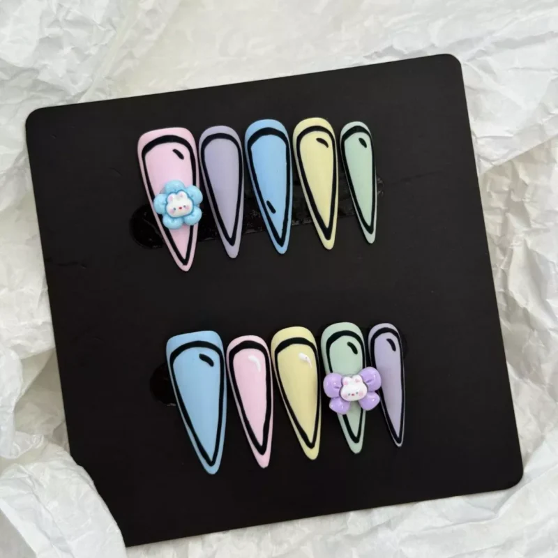 Trendy 2D Cartoon Press-On Nails with pastel hues and floral details
