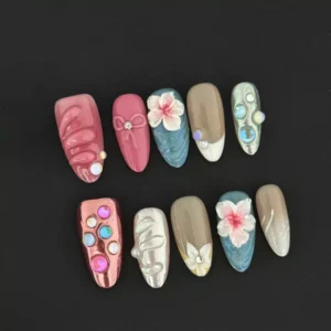 Tropical bloom press-on nails with 3D wave textures and crystal shell accents