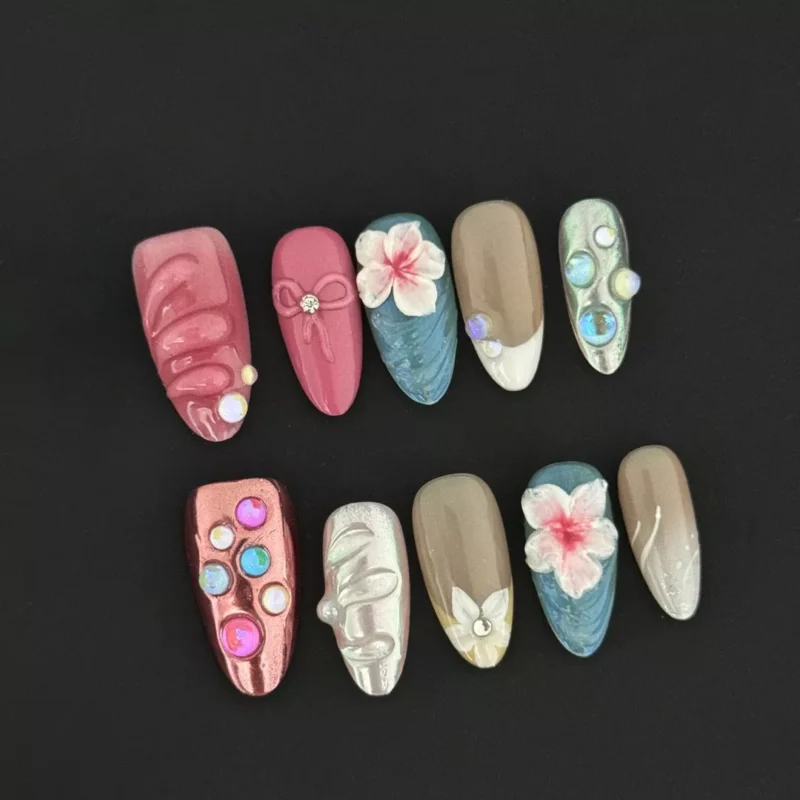 Tropical bloom press-on nails with 3D wave textures and crystal shell accents