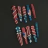 USA Sparkle Press-On Nails with red and blue glitter stripes and rhinestone star accents