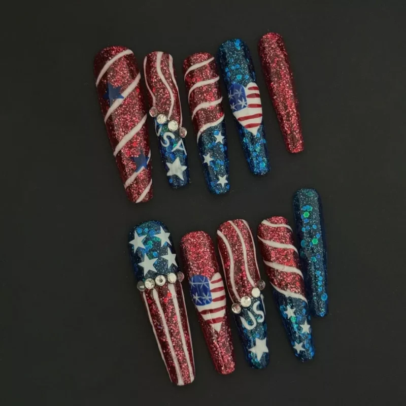USA Sparkle Press-On Nails with red and blue glitter stripes and rhinestone star accents