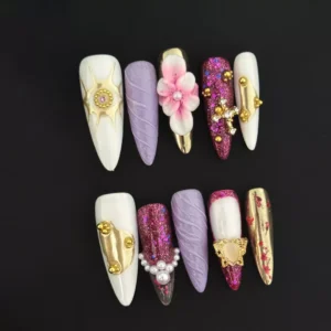 Vanessa Press-On Nails with cross accent, pink glitter, and baroque crystal elements on stiletto tips