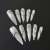 White Metallic Press-On Nails - 3D Swirl Mirror Finish 6 White Metallic Press-On Nails with 3D Swirl Mirror Finish displayed on black background