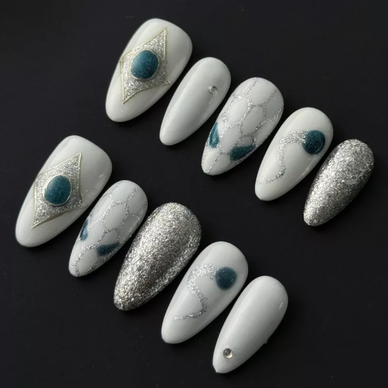 Elegant White and Silver Press-On Nails with Teal Accents