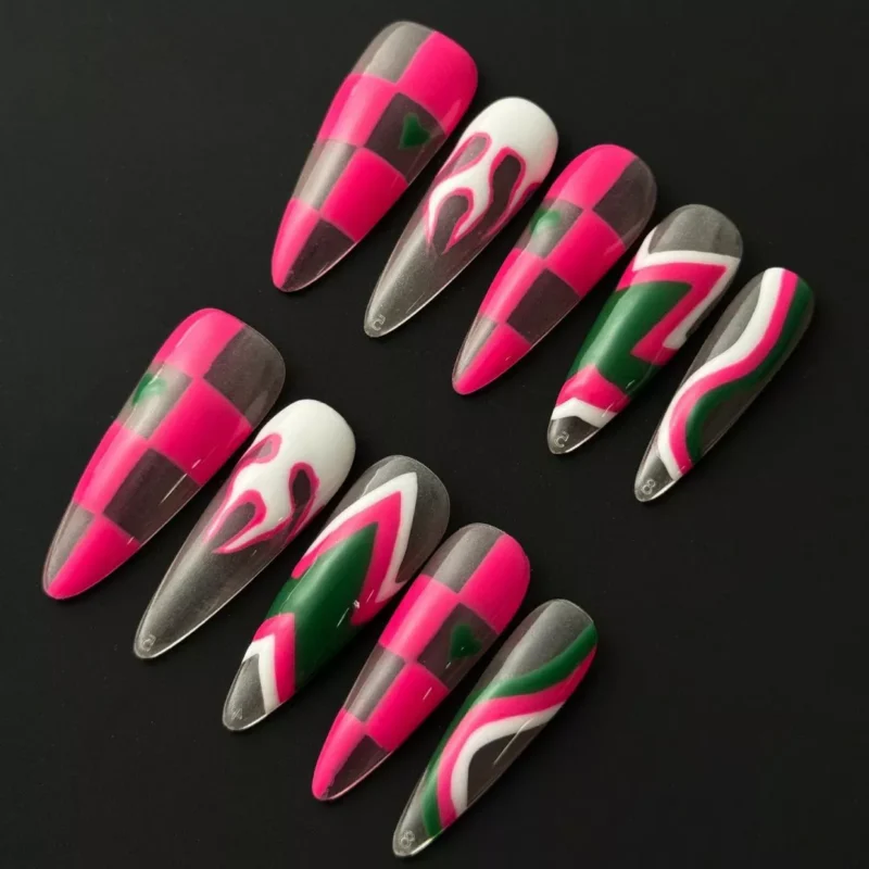 Y2K flame press-on nails with pink grid and abstract swirls – top view showcasing mixed design