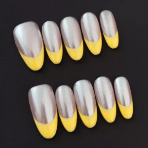 Hand wearing Yellow French Press-On Nails in medium square shape
