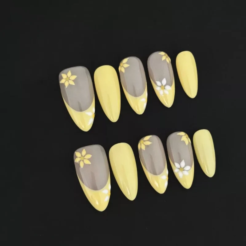 French Press-On Nails with yellow daisy design on almond shape