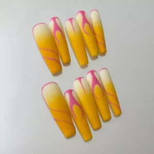 Yellow ombre matte press-on nails with pink flame design