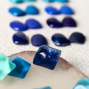 Close-up of 3D gel polish texture with Klein blue square gel samples