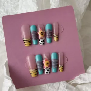 3D hibiscus charm and safari motif on tropical jungle press-on nails