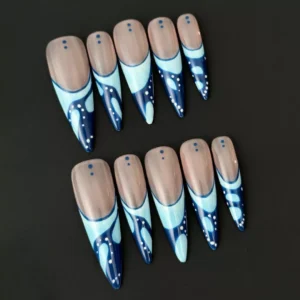 Abstract blue press-on nails with glossy finish and dotted French tip details