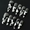 Black and white flow press-on nails – stiletto shape with glossy abstract lines