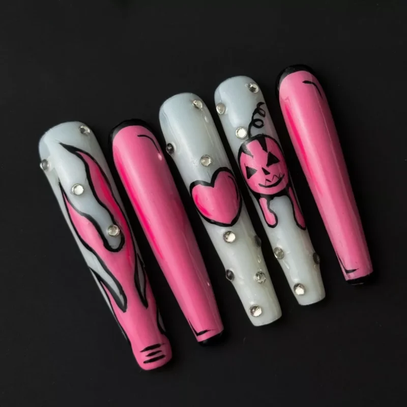Cartoon pink Halloween nails with flame and heart designs – front view of glossy stiletto set