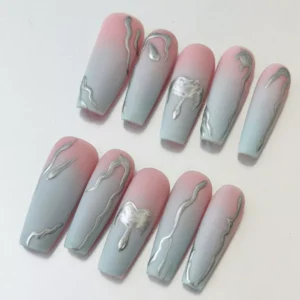 Close-up of metallic chrome lava line detail on gradient matte nails