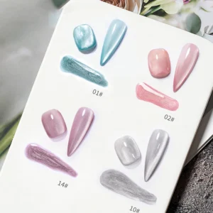 Swatches and strokes of Glass Cat Eye Gel Polish in mint, pink, lilac and silver with dual finishes